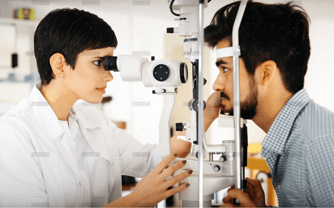 demo-attachment-1398-optometrist-examining-patient-in-modern-RXUVD5T